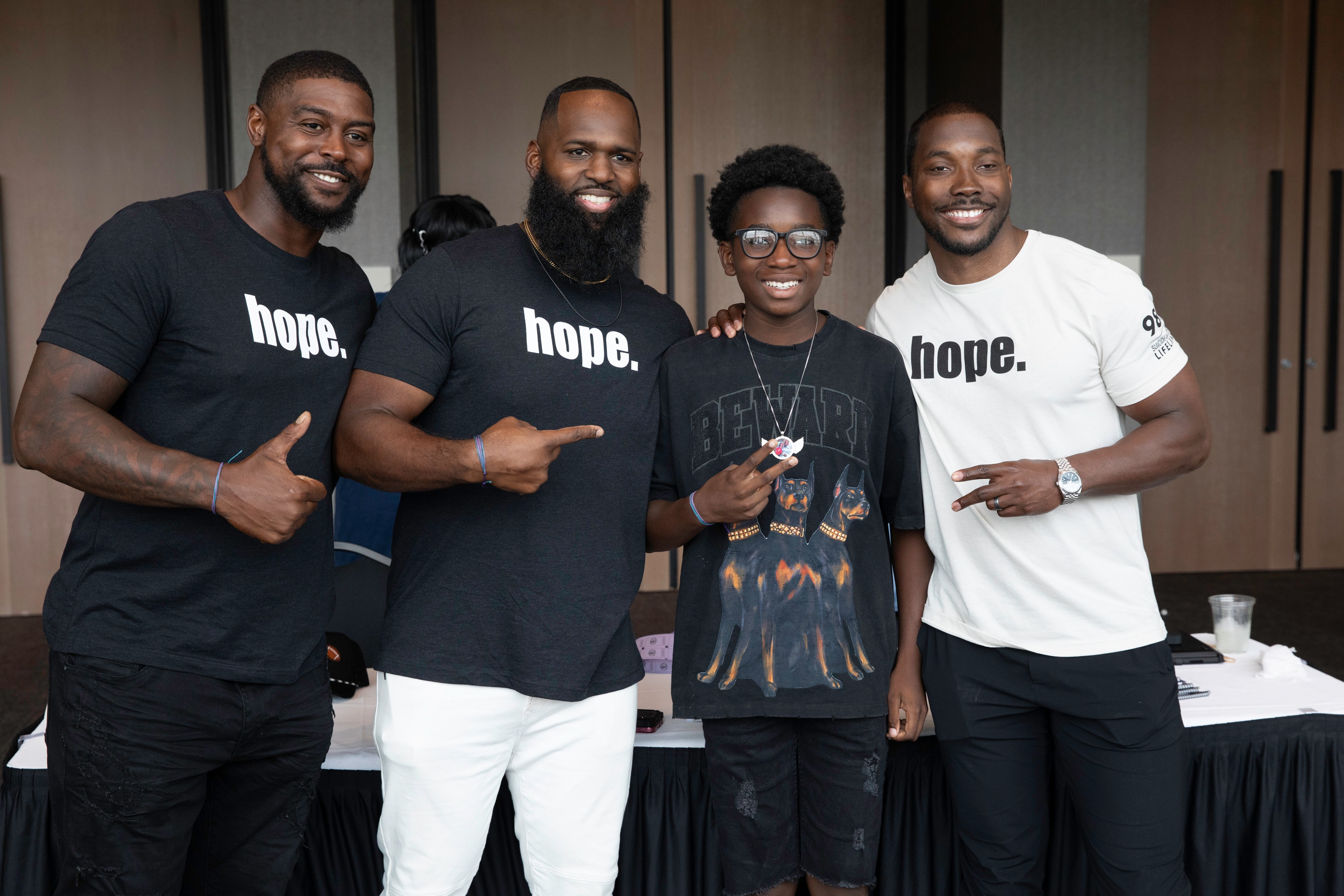 Andre Fluellen with students and community members